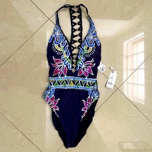 Brand new Trina Turk one piece swimsuit reversible